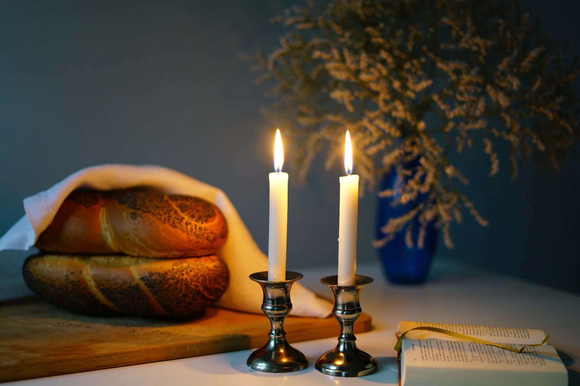 Shabbos candles with challah